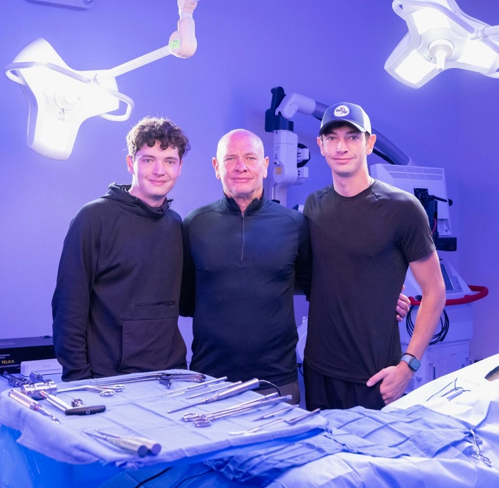 Kyle, Robert Masson and a colleague in an operating room