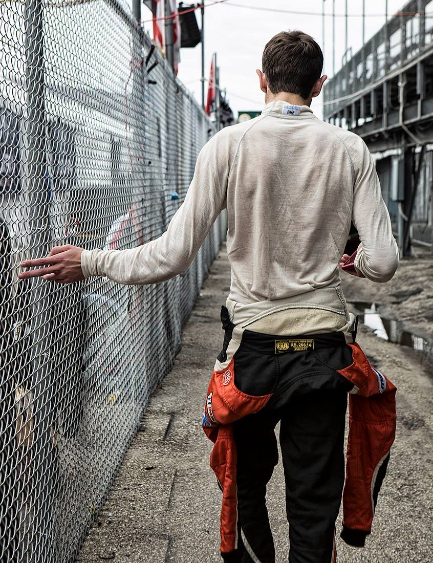 Walking the fence line in race gear